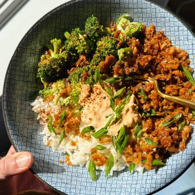 Teriyaki tofu in a bowl with rice, Kimchi mayo, and broccoli.