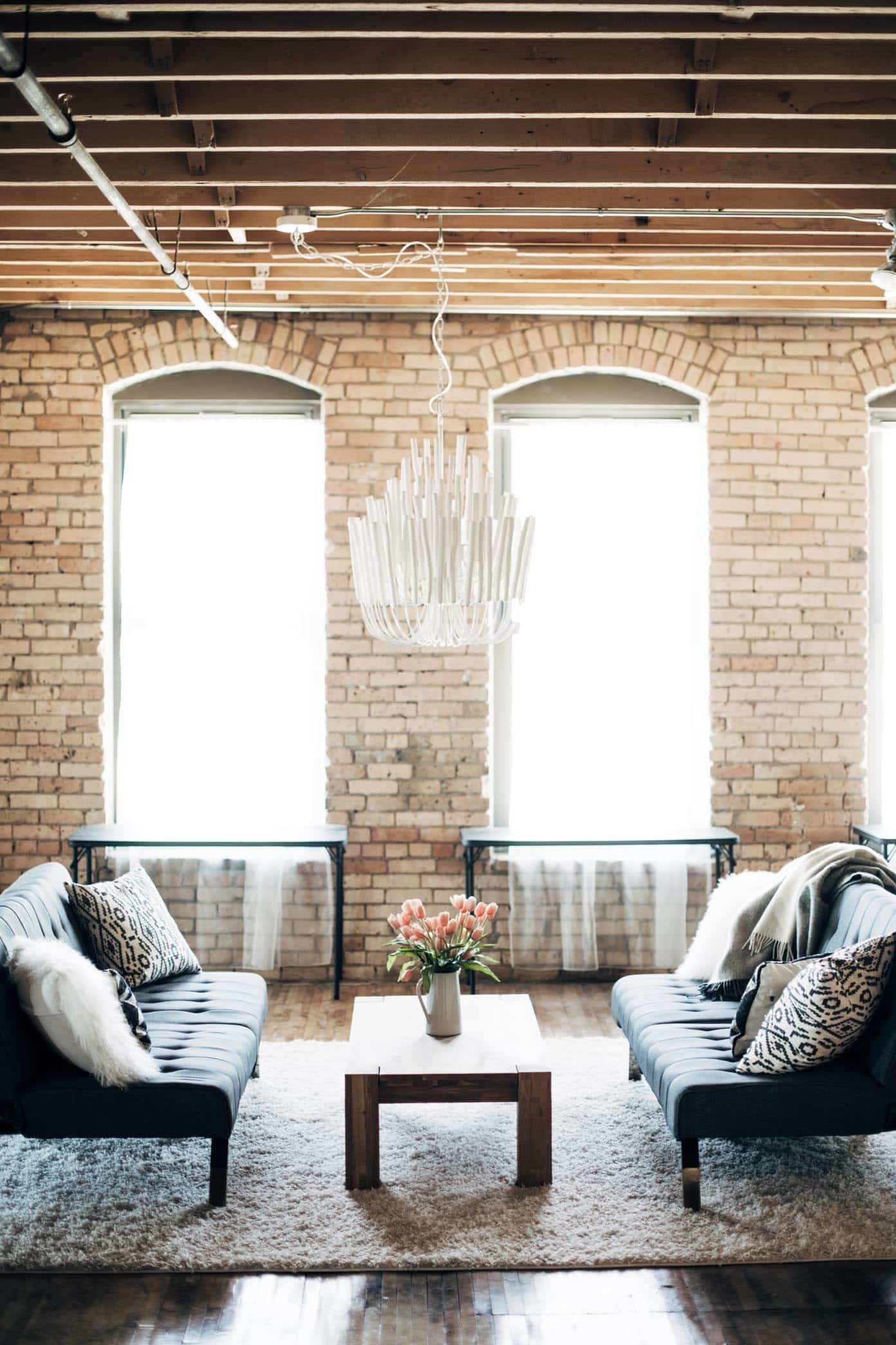 Studio with futons and a coffee table.